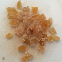 Candied ginger about to be diced into quarters